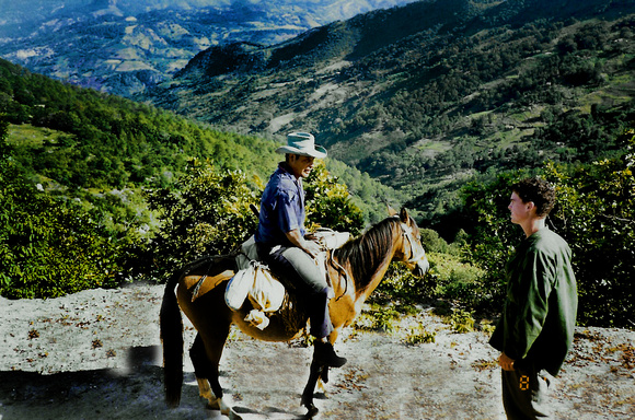 Sam C Jeremy talking to man on horse