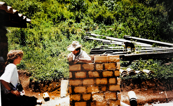 Sam ChavezAdobe outhouse under construction